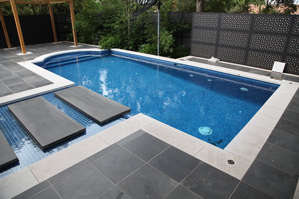 Bluestone and snow white sandstone pool